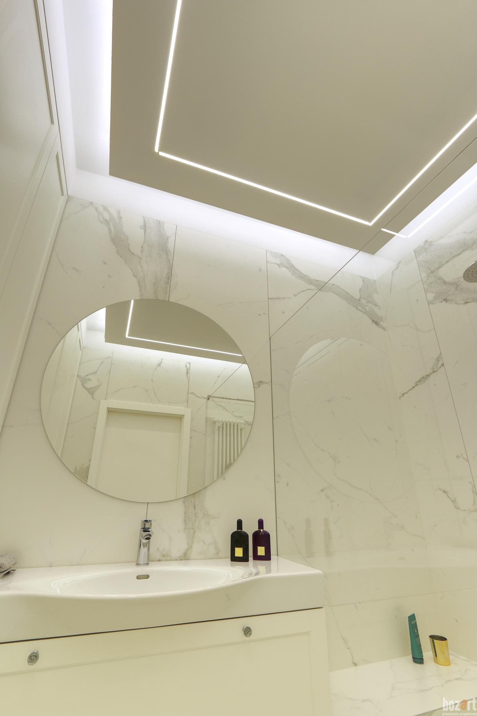 pracownia architektoniczna warszawaokrągłe lustro w łazience